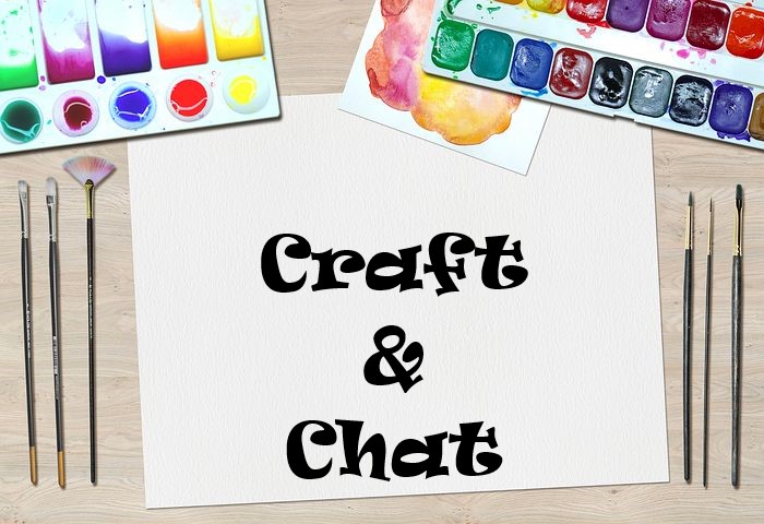 Paint supplies surround a canvas that says Craft & Chat