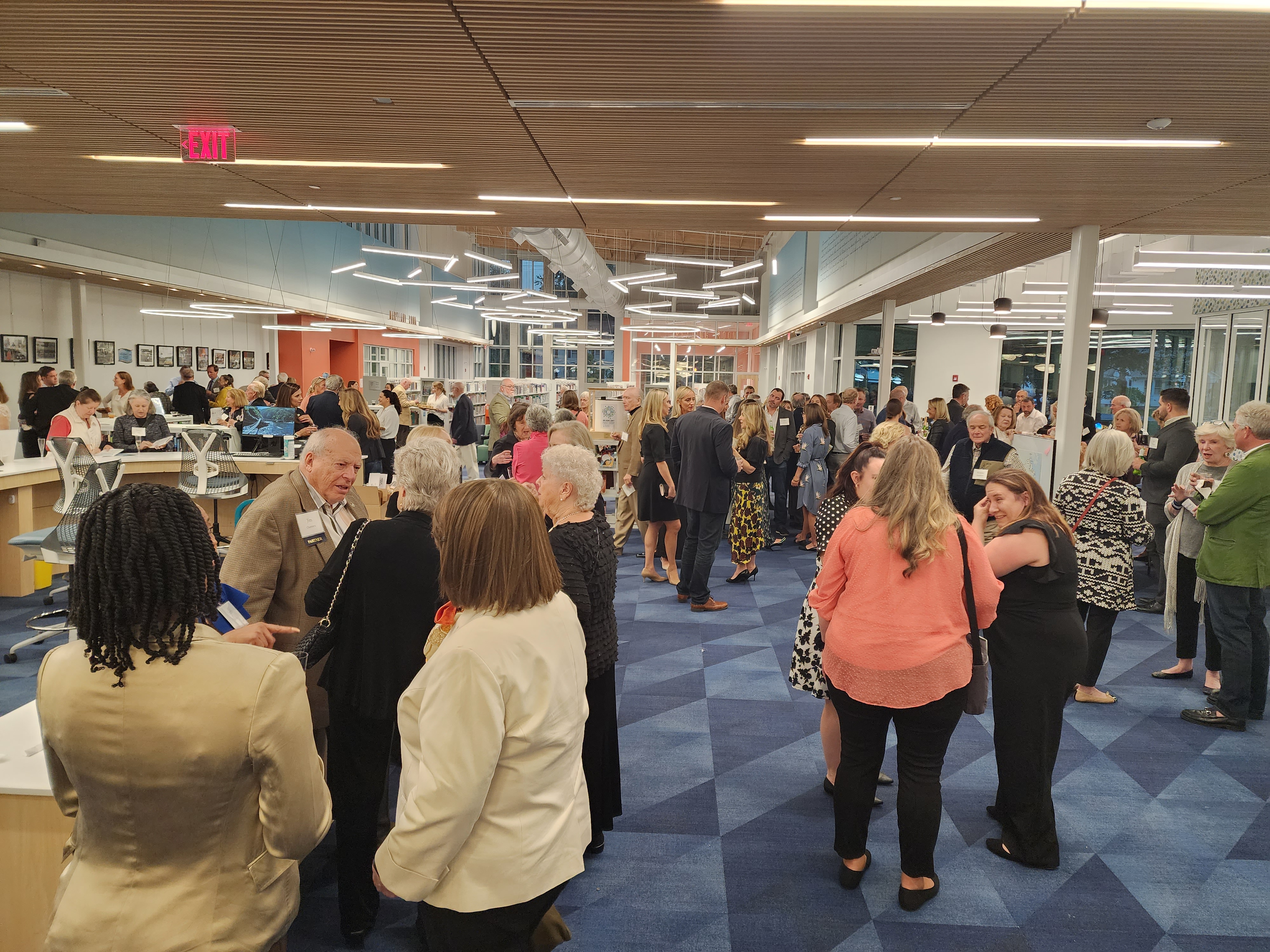 Large group of guests inside the Annapolis library. 