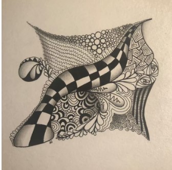Zentangle® drawing with different tangle patterns as part of the drawing.