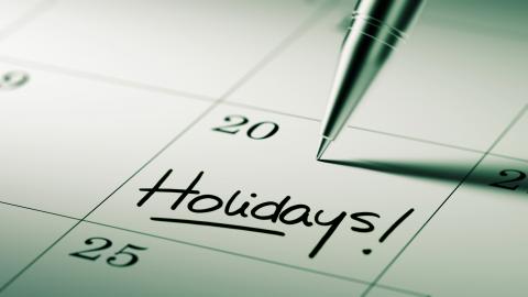Calendar with a day marked as "Holidays!"