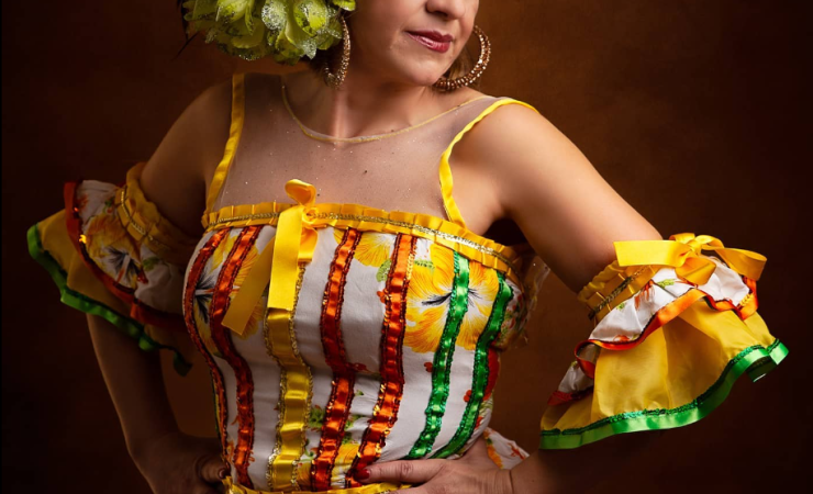 Woman with colorful costume and hairpiece